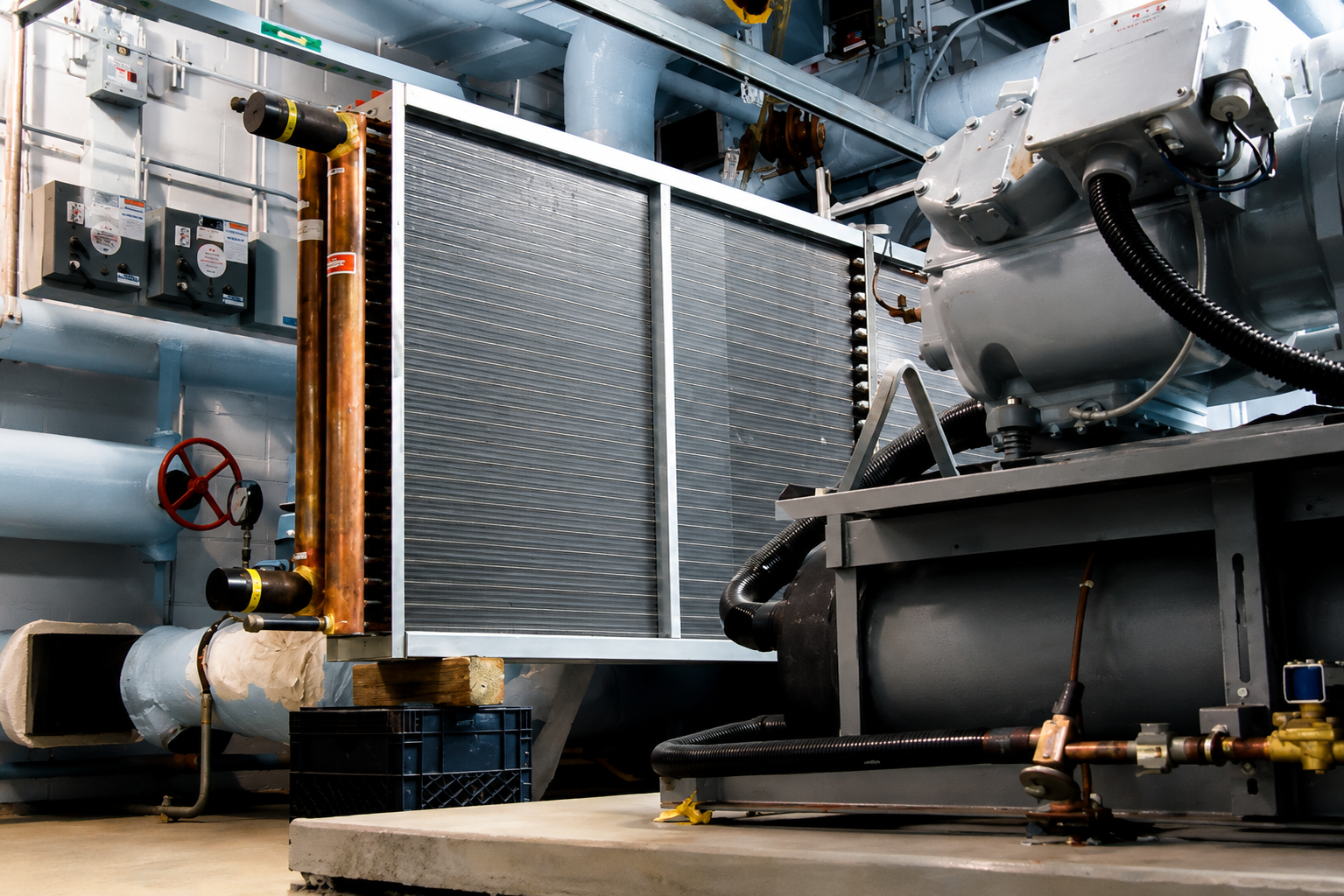 A large modular fluid coil installed in a chiller mechanical room